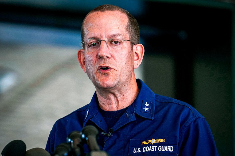 U.S. Coast Guard Rear Adm. John Mauger, commander of the First Coast Guard District, speaks to the media.