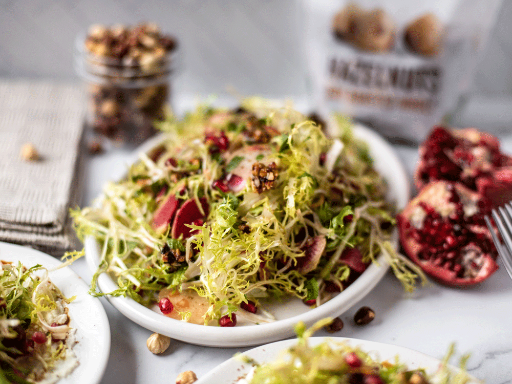 Pomegranate, Radish, Frisée Salad with Pomegranate Molasses Glazed Hazelnuts