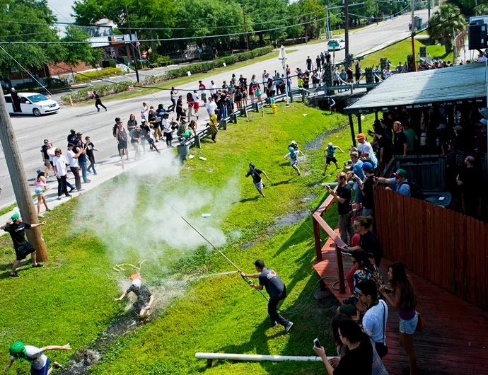 <!--moatphotos2018-->

2016 was the last year we did the Moat Race. This was 2015 and Bart shot this photo from up in Schaefer's office. At that point, all the cameras were afraid to go down into the thick of it because the egg throwing just got out of control. It was a wild ride while it lasted, but nothing good lasts forever. Maybe one day we'll bring it back...