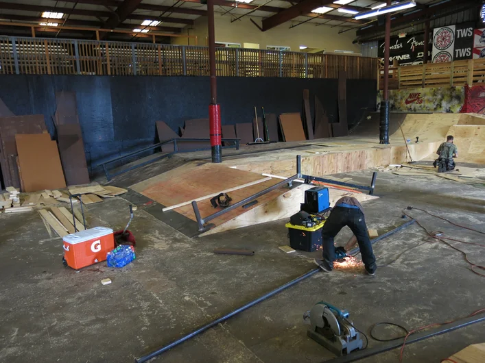 <!--makeover2-->

Some silky new coping being cut.