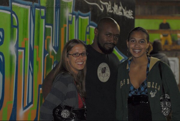 Mike Goodwine with girlfriend and daughter