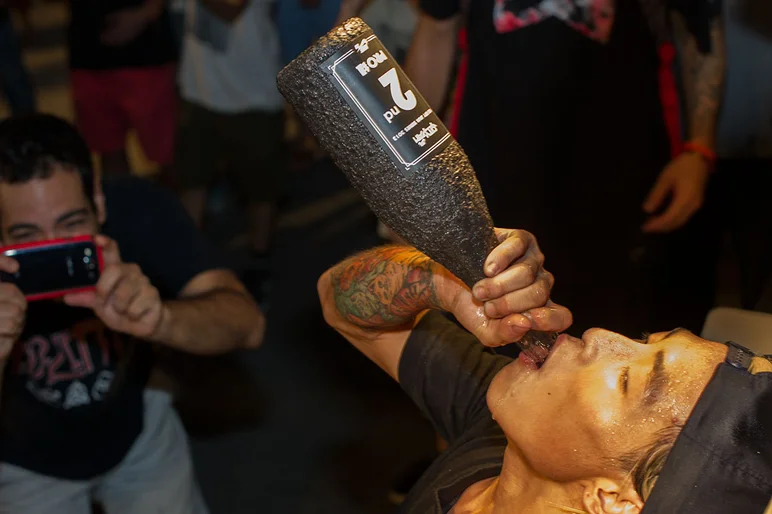 <!-- damnamshanghai2 -->

Li Zhi Xin celebrating his second place win with a champagne swig. 





