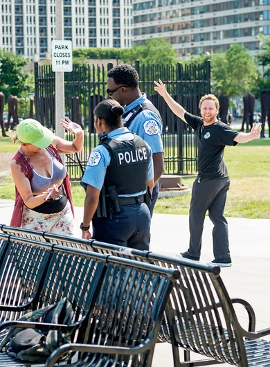 <!--dachi18bt-->

Everyone loves having their photograph taken when the cops are present. Some, like this lady, even likes to do a lil dance for em’.
