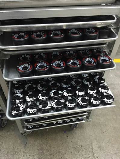 <!--vansca-->

We pretty much followed these wheels through the process of being created. After they’re printed, they’re all laid out on trays to cure like cupcakes.