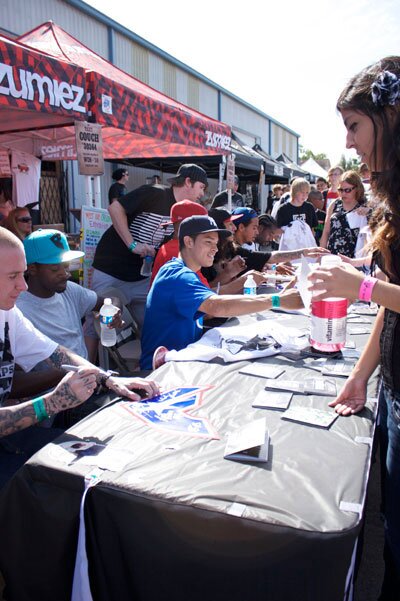 The Famous team was signing autographs