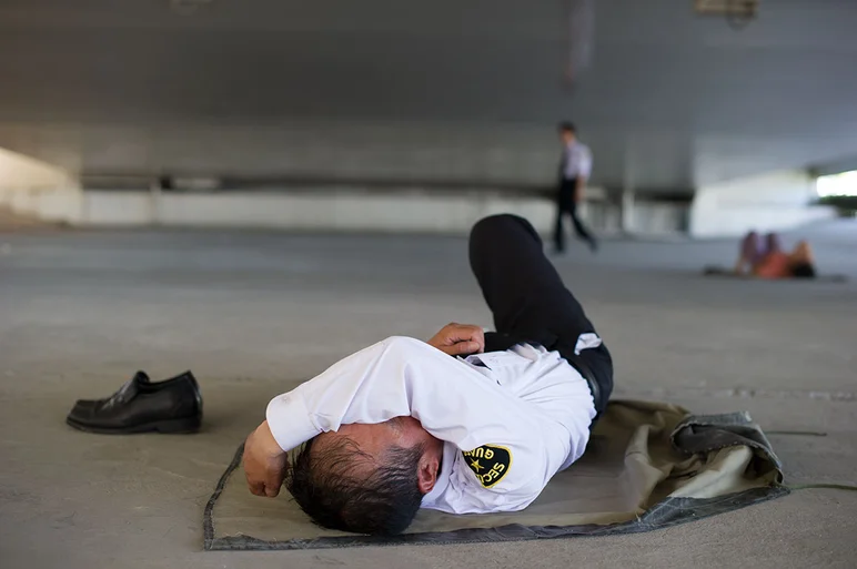 <!-- damnamchina2013 -->

At the next skate spot, we interrupted this security guard's nap in the insane heat. How could you sleep like this!?
