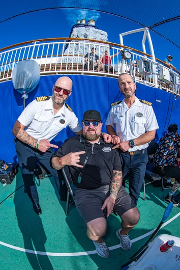 Man in the middle is our guy Murder. He helped us setup, made sure we had water and beers, AND the captains loved him

<!--floggingmollycruise23-->