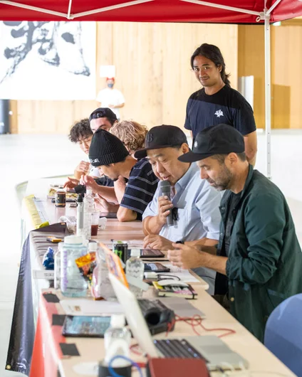 Paul Zitzer on the mic with Akio Homma, the owner of Instant Skateshop which is the largest chain of shops in Japan

<!--damnamjapan2022day2-->