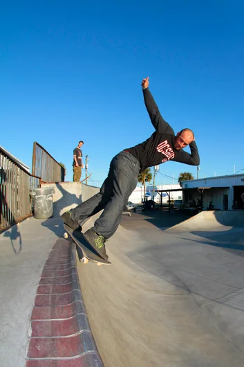 <!--ombj15-->

John May was warming up for his run. Switch BS Smith Revert.