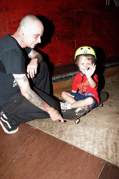 One of the A-Skate volunteers explaining how to