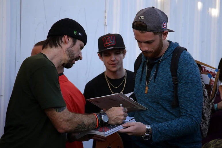 <!--pro17-consjam-->

Chris Cole was hanging out too, signing autographs for the masses.