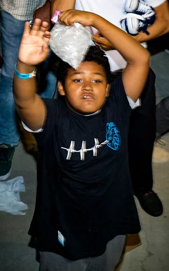 <!--am17-ccj-->

This poor kid got javelined in the head with a board, so we hooked him up with some free swag. I don’t think that's gonna help the bump on his head, but at least maybe  it'll     cheer him up a bit.