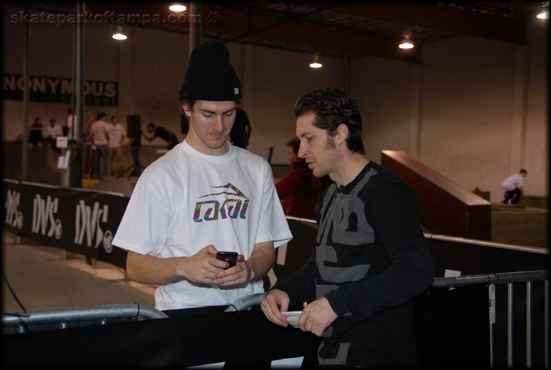 Mike Mo warms up for a game of SKATE by texting