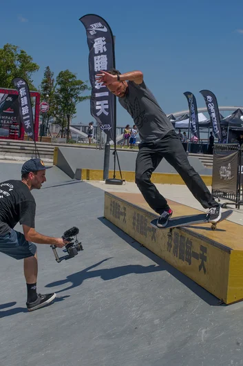 <!-- damnamchina2013 -->

We showed up at the contest spot where we broke in the new course with some skateboarding maneuvers.  Here's Zitzer with a feeble grind, filming for SPoT Life. 