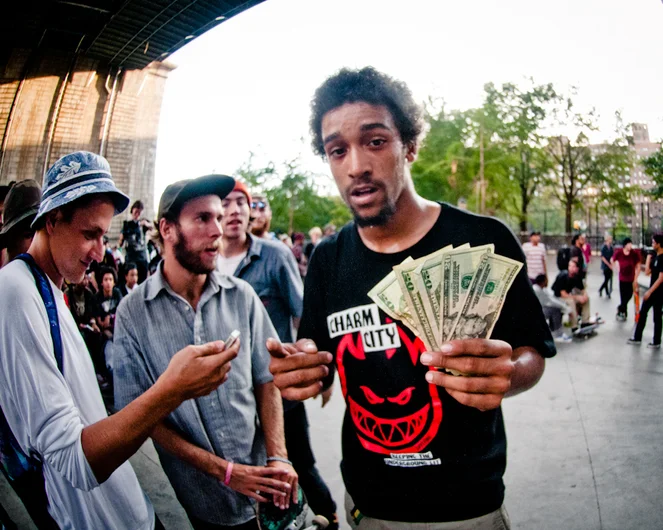 <!--nyc14day3-->

Tyrone Henderson with his winnings from that $100 switch flip!