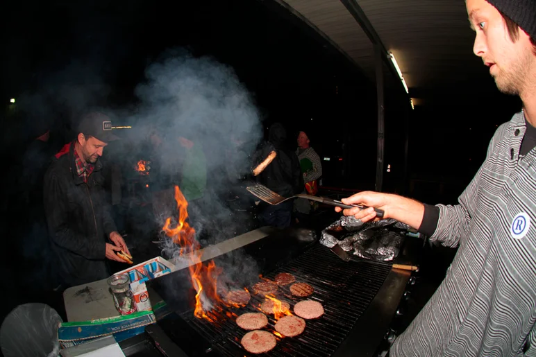 <!--ombj15-->

Josh Knight flippin' burgers for all.