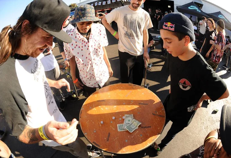 <!-- amdec13sat -->

Tyshawn Jones, Chris Blake and Alex Midler watch as their money may disappear with this roll of the dice.