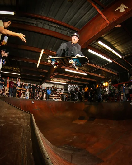 <!--ombj20photos-->

Mike Peterson flying while Sam measures his height.
