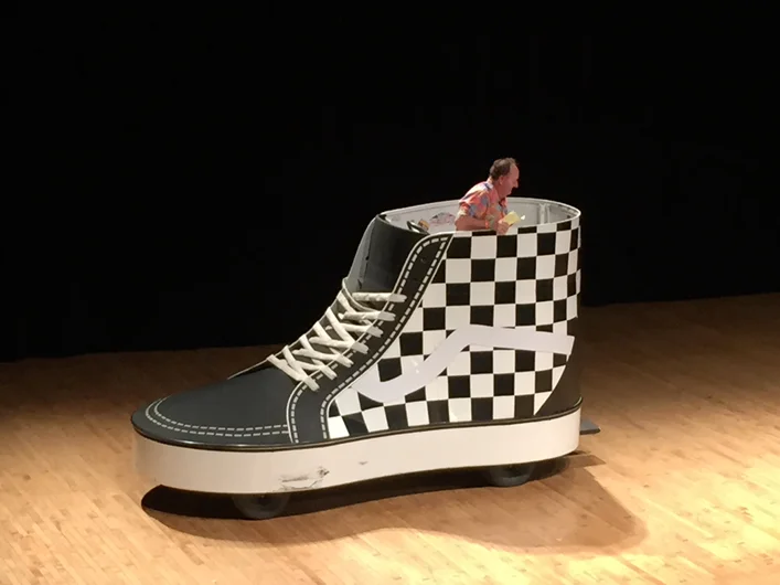 <!--vansca-->

After Ray ripped the final song, Steve Van Doren himself made one hell of an entrance riding in on this huge motorized Sk8 Hi.