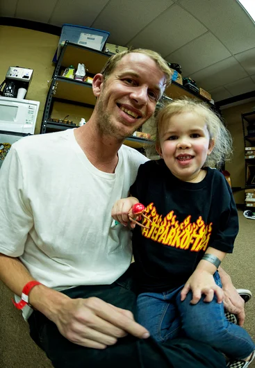 <!--pro18-finals-->

Frank Branca does a little daddy day care between filming lines.
