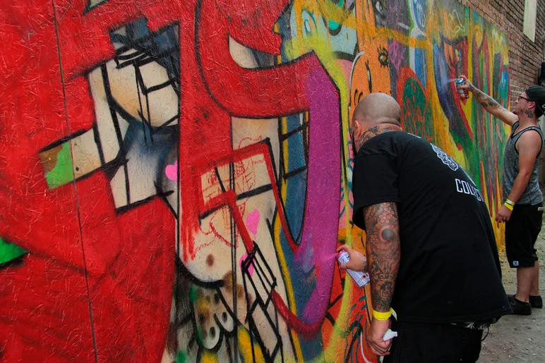 <!--bricks5year-->
Some live spray painting art going down. That's Esben from Bloodline tattoos across the street from The Bricks. Those guys were nice enough to let us put our ramp in their backyard for last year's 4-Year Anniversary Party. Thanks dudes!