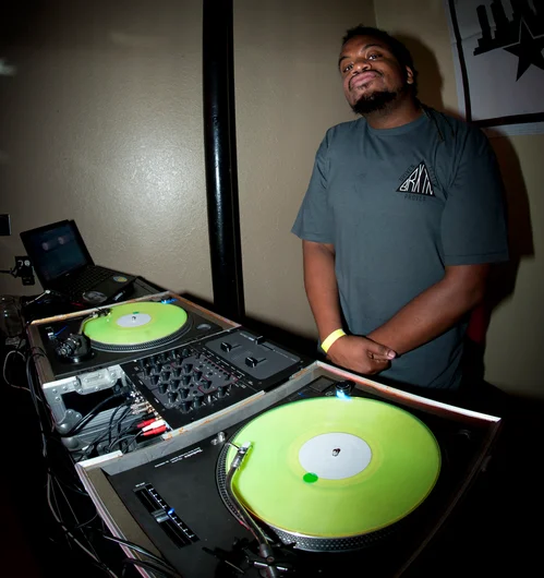 <!--ybor4year-->

The party goers on 14th street made their way into the Bricks for more booze and music being laid down by DJ Qeys. I was diggin' his neon vinyl.











