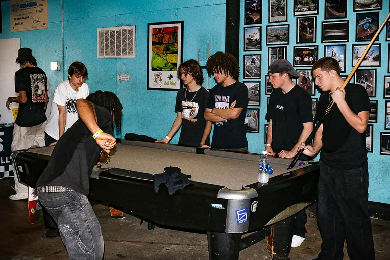 The pool table is always a popular hangout spot.


<!--cotc2024-deathrace-->