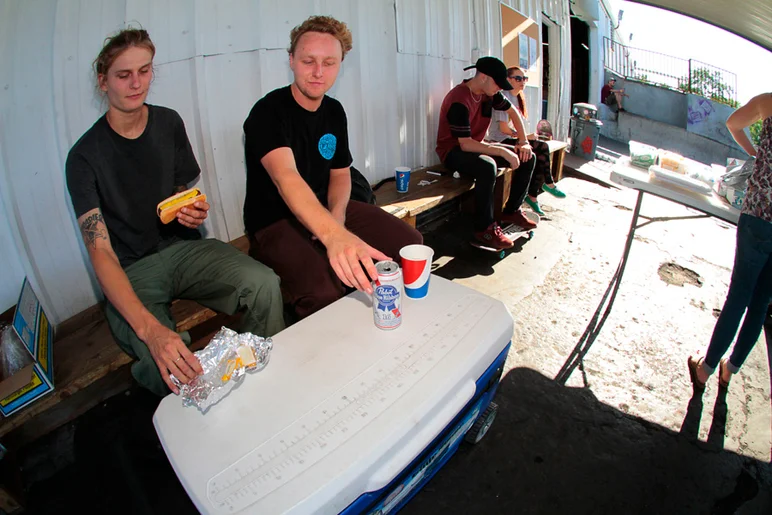 <!--eotmapr16-->

Eric and Derick refueling with some free food and PBR.