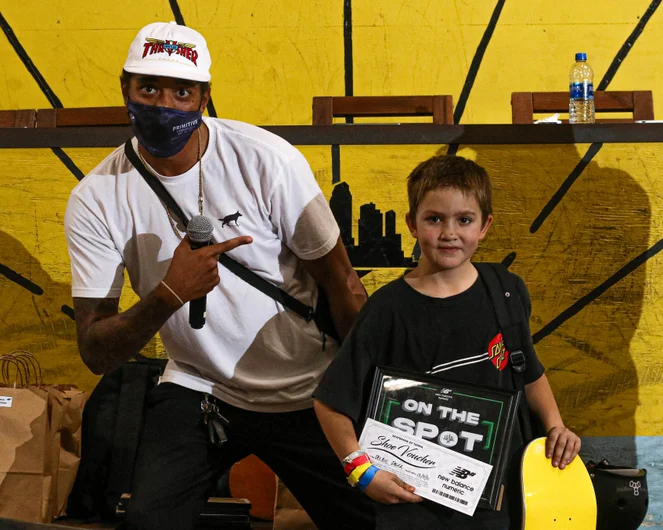 Delbie Jager takes home first place and free pair of shoes courtesy of New Balance.<!--onthespot21-->