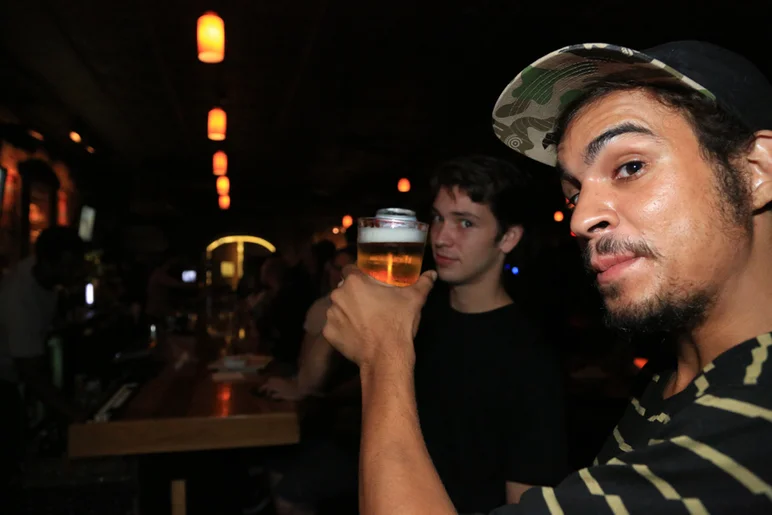 <!--orchard2014-->
When arriving, Chad and Manny Claudio grabbed a beer to celebrate a good day.