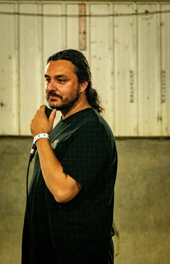 Wait!?! What the hell is with this guy grabbing the mic?!? 
<!--tampam2022madnessconcretejam-->