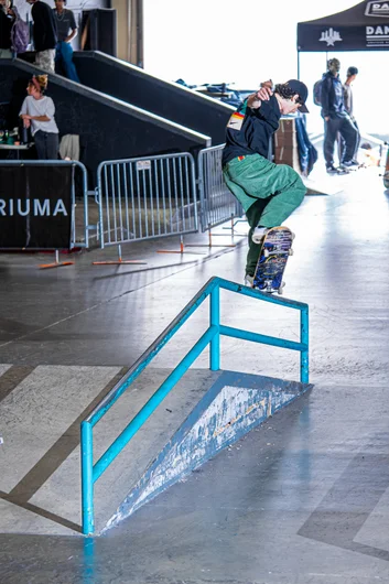 Josue Lozano perfectly locked into a front nosegrind into the bay door sunlight.

<!--damnamla2023-->