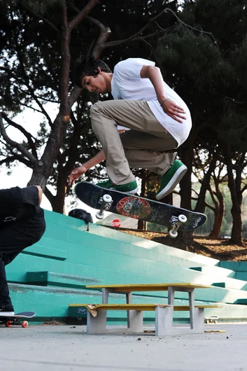 Daniel has a hardflip over this picnic table and probably real ones, too.<!-- A California Work and Play Day -->
