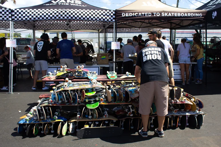 <!--mattwoodsday18-->

Joel stacks up all the completed boards.