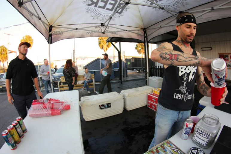 <!--ffombj-->

Mikey takes a break from helping us build our new venue to pour beers for all the thirsty old dudes.