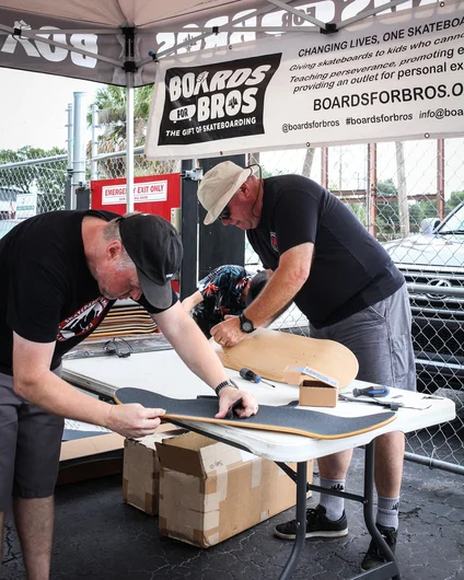 <!--soj19photos-->

Joel & Woody putting together completes for Boards for Bros.