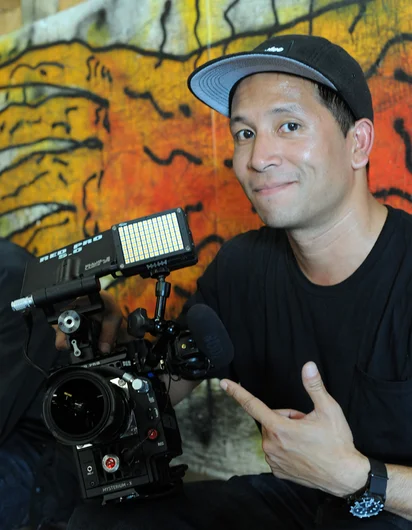 <!--tampapro2014-->

Let's pause for a gear check. I spotted RB Umali filming Chaz Ortiz with a Red Pro camera and had to get a photo of him with it.
