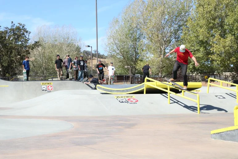 <!-- woodwardwestday3 -->

Dylan is setting up for a nollie flip out of this crooked grind.