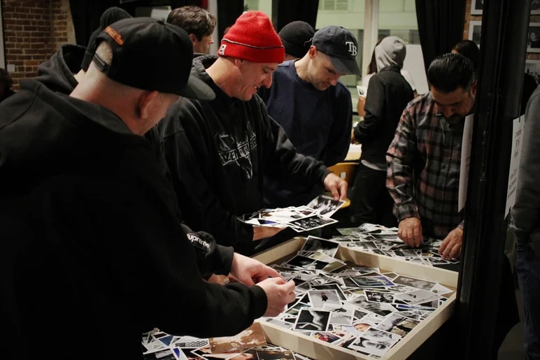 <!--pro20deckaid-->

John Montesi searching through Pete Thompson prints.