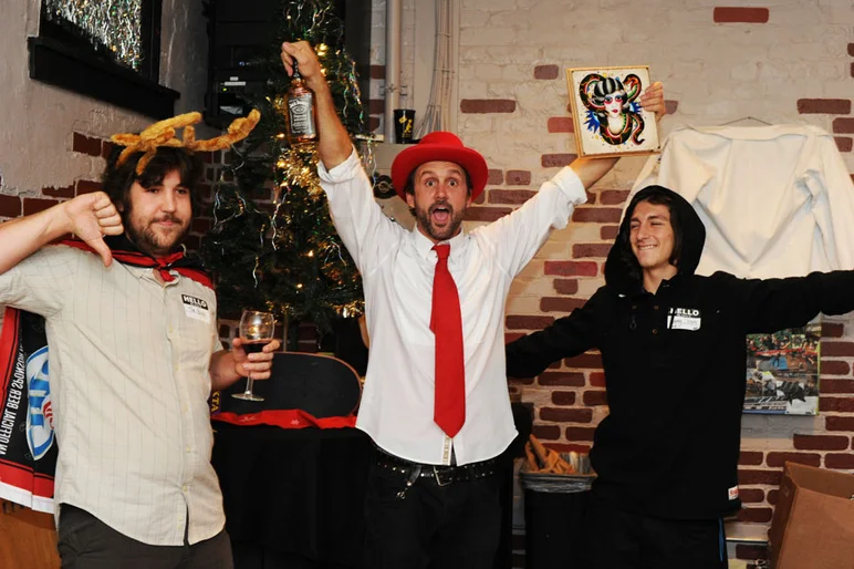 Art wins over booze and the gift exchange is a wrap, or should I say unwrap.<!-- SPoT Employee Christmas Party at The Bricks 2012 -->