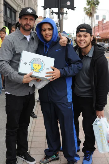 Schaefer, a fan, and a photo bomber.<!-- SPoT 20 Year Nike SB Dunk Low Release -->