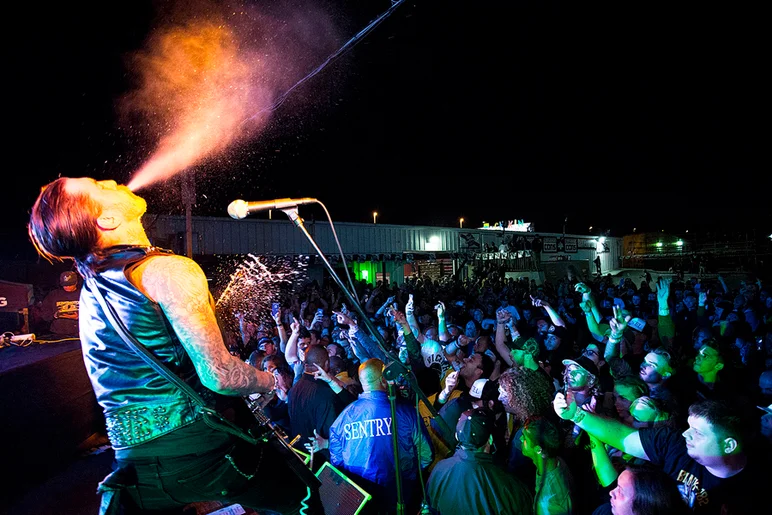 <!--pro16satnight-->

Yelawolf's guitarist wanted to share some of his beer with the fans.