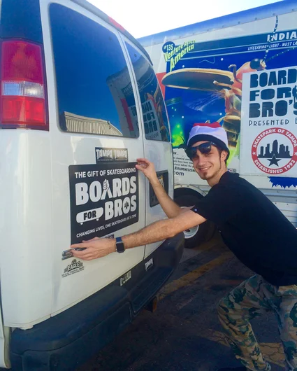 <!--b4bdelivery-->

Sam Saiger making sure the SPoT van looks tight.