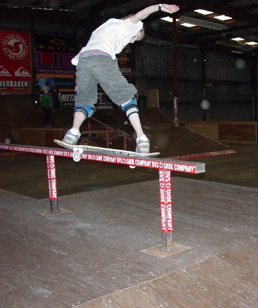 Grant Taylor - Backside Lipslide at Tampa Am 2003