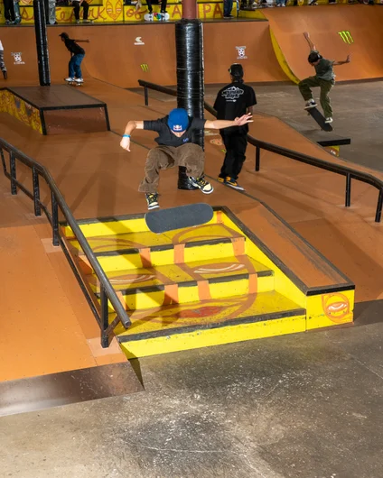 Jiro with a quick frontside flip down the 4 block during practice.
<!--wednesdaytampaam2021-->