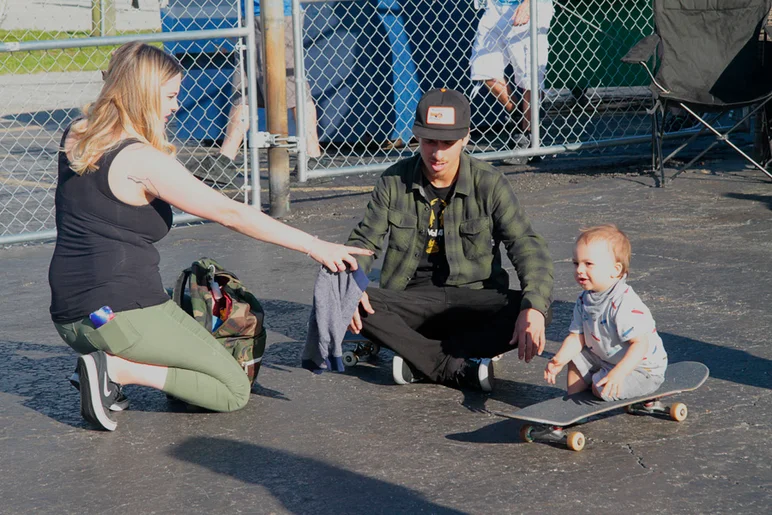 <!--eotmapr16-->

Abdias Rivera and his family. Totally backing this; baby is already picking up on his dad’s skills.