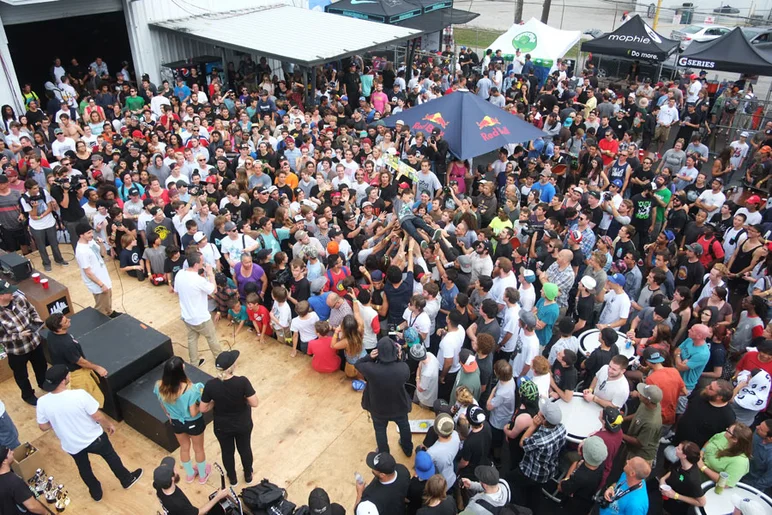 I spy a baby crowd surfer.<!-- Tampa Pro 2013 Skateboarding and the After-Party -->