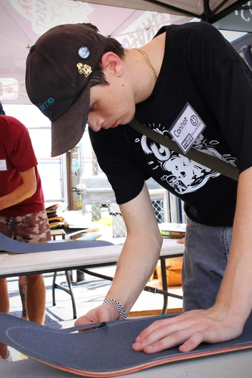 <!--mattwoodsday18-->
That's Collin - he helps us out with Skate Camp sometimes and also does a mean grip job.