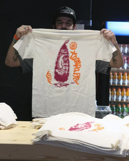 <!--pro17-frinight-->

That's Matt from Element holding up a custom Tampa Pro 2017 shirt, with artwork by Thomas Campbell. They were giving these out all last night to anyone lucky enough to stop by the bar. Thanks dudes.