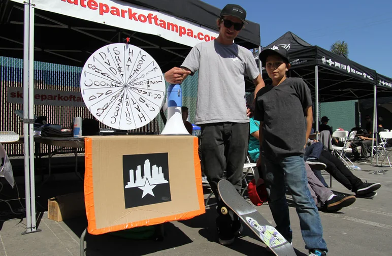 Casey Wayne holding down the SPoT tent all weekend.<!-- Damn Am Costa Mesa 2013 Presented by Volcom -->